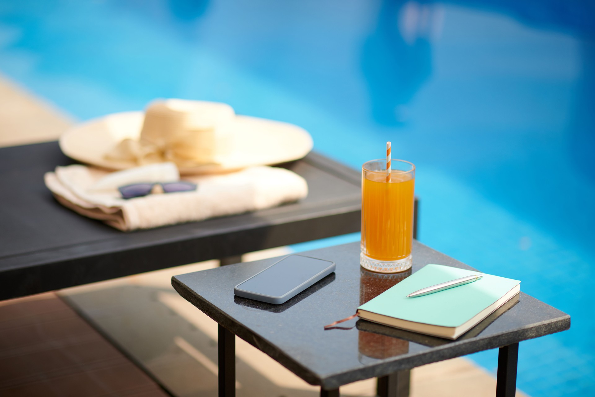 Table Next to Swimming Pool